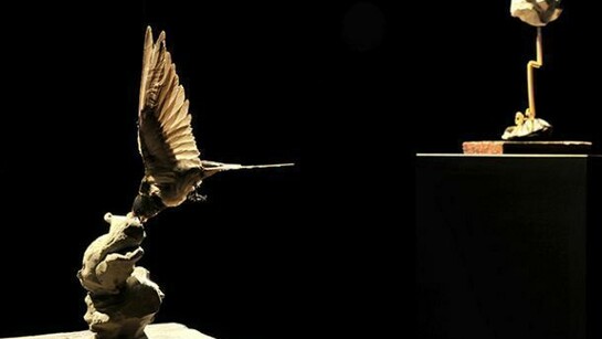 Polly Morgan, Foreground: In there somewhere
64 x 39 x 16 cm, Embalmed Swallow and Jesmonite. Background: Lightening Never Strikes Twice, 31 x 18 x 13 cm, Merlo Indian embalmed, pencil and paper