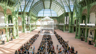 Chanel's Spring-Summer Ready-To-Wear Show held at the Grand Palais Museum in Paris, France, in the last week of September, 2024, showcasing a dazzling collection of soft blues, pinks, and yellows, along with the iconic white birdcage as the centrepiece