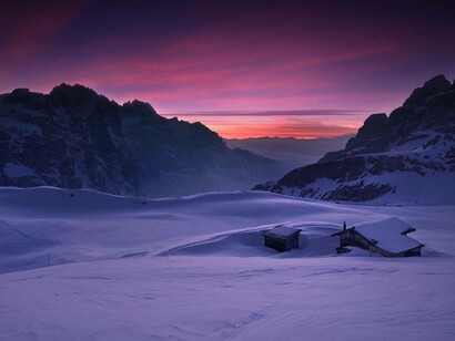 Wintertime in northeastern Italy, a cabin in the snow of the Dolomite mountain range