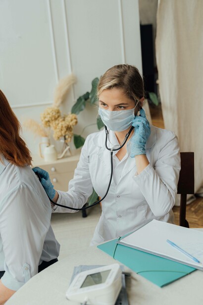 Checking for breathing before carrying on with the procedure