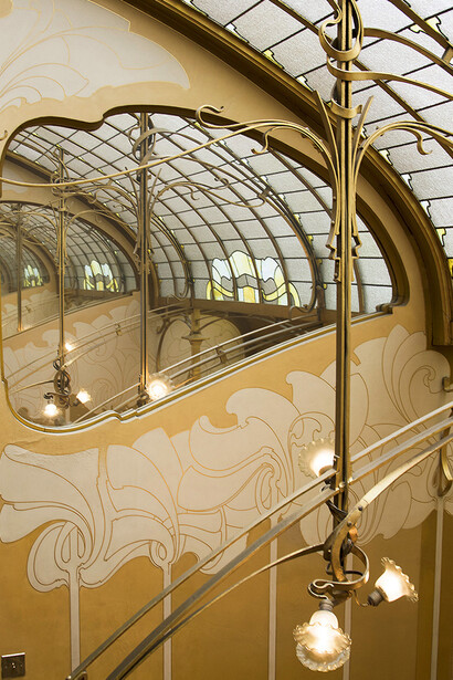 Inside Casa Batlló, with its ornate ceiling and expansive windows designed by Antoni Gaudí, Barcelona, Spain