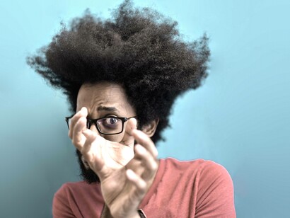 A man doubting his ability to succeed and experiencing imposter syndrome