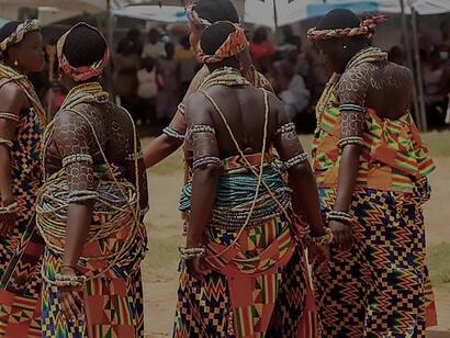 Amidst the festivities in Ghana, these Krobo girls grace the occasion, adorned in the resplendent colors of Kente