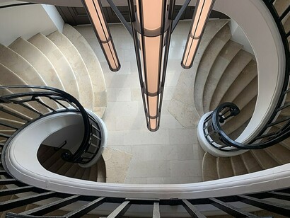 The historic double-helix staircase inside the Bourse de Commerce in Paris, France