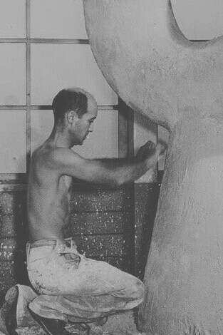 Noguchi working on the plaster original of “Mu,” 1950, The Isamu Noguchi Foundation and Garden Museum, United States