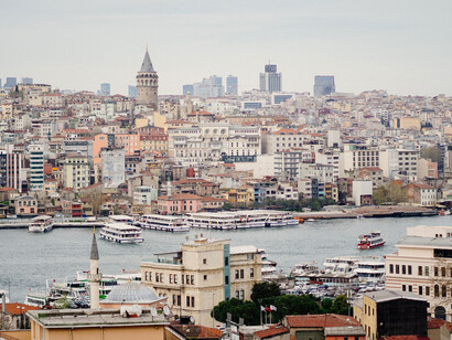Galata tower rises over ciry and the Bosphorus strait, Istanbul, Türkiye