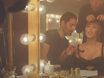 Miley Cyrus appears in the Easy Lover music video, embodying the song's emotional intensity through striking visuals