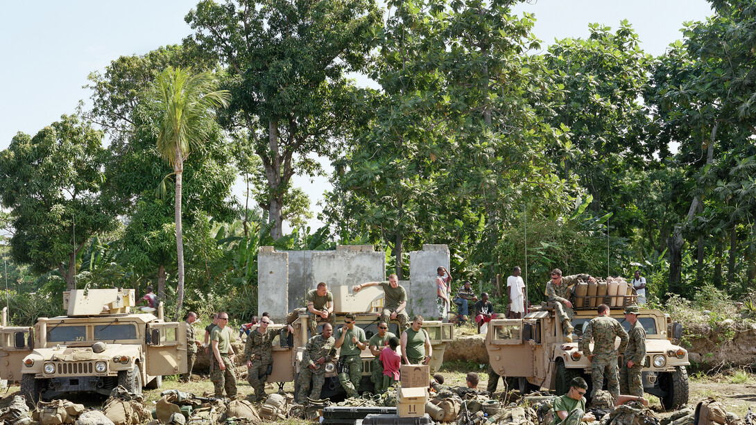 An-My Lê, Earthquake Relief, Marine Corps Weapons Company Beach Landing Site, Haiti, 2010, Archival pigment print, 40 x 56 1/2 inches, Edition of 5, Image courtesy of the artist and Murray Guy, New York
