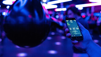Male engineer monitors boxing performance through athletic devices © This is Engineering