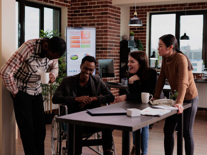 A diverse team collaborates on a digital platform, using AI tools to track project progress and automate routine tasks, ensuring a more efficient workflow
