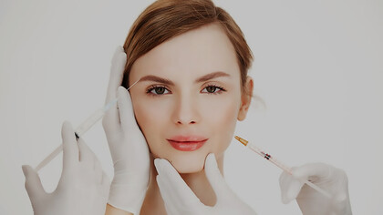 Experience the artistry: expert cosmetologist administers precise botox injections for skin lifting and facial enhancement in beautiful blondes during advanced facial treatments