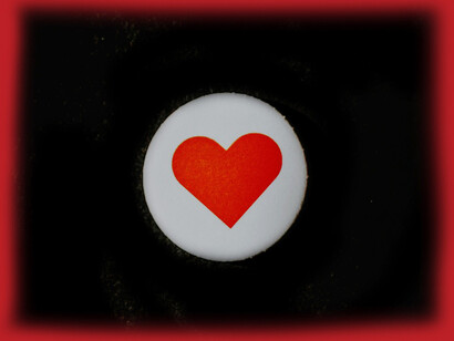 A heart button represents the impact of social media 