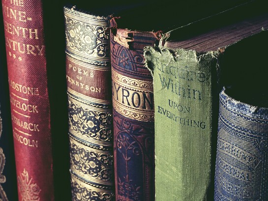 An intimate literary still life evoking HoleniaPoesia’s mission to recover forgotten voices, where aged books, manuscripts, and early twentieth-century journals turn poetry into memory, resistance, and rediscovery