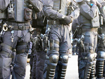 An image of armed police, Lisbon, Portugal, reflecting the intense atmosphere of the recent events in the area