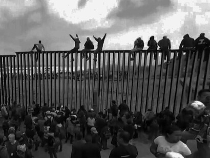 Members of a migrant caravan seeking asylum in the United States reached Tijuana, Mexico