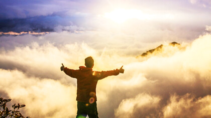 A person enjoying the positive emotions brought about as a result of happiness