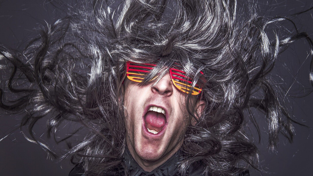 Musician wearing colorful glasses