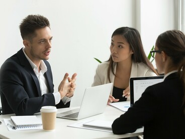 This scene illustrates the matching process in the labor market, where firms assess candidates' skills and productivity, and workers seek optimal roles