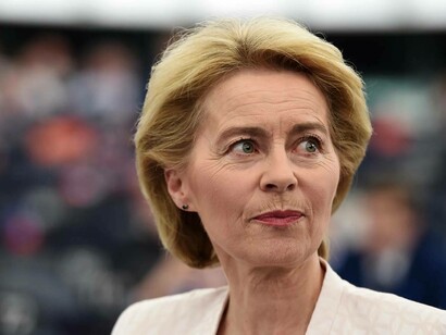 The president of the European Commission, Ursula von der Leyen listening to her advisors at a conference in Dublin, Ireland