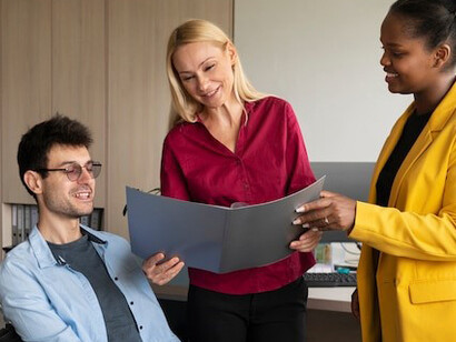 Colleagues working together in a Diversity, Equity, and Inclusion (DEI)-focused company, fostering collaboration and a supportive workplace culture