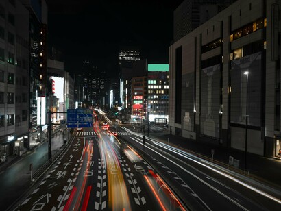 A glowing artery of motion, this cityscape reflects the relentless pulse of modern civilization