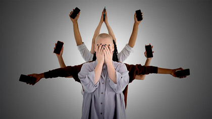 All the people are connected, using mobile phones, except for the girl in the foreground who is choosing to disconnect