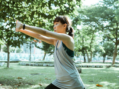 As she stretches in the park, she’s preparing to harness the power of exercise to elevate her mood and reduce stress, proving that fitness is key to mental well-being
