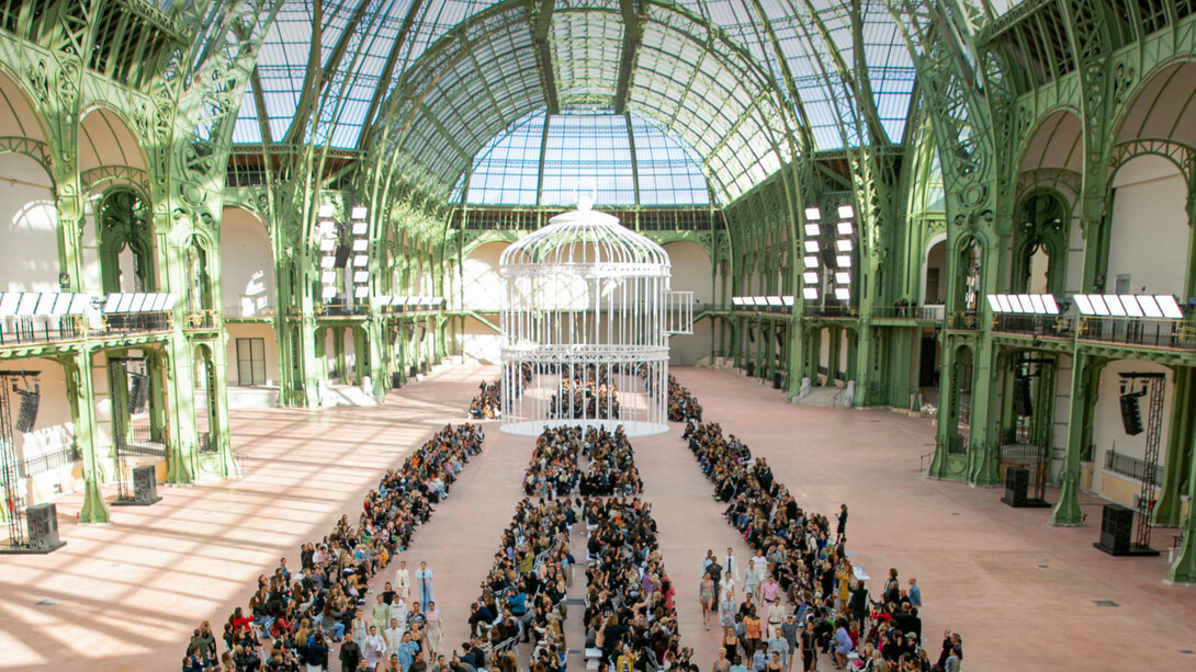 Chanel's Spring-Summer Ready-To-Wear Show held at the Grand Palais Museum in Paris, France, in the last week of September, 2024, showcasing a dazzling collection of soft blues, pinks, and yellows, along with the iconic white birdcage as the centrepiece