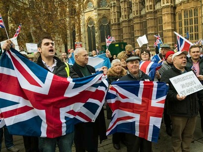 English people protesting Brexit and invoking nationalism