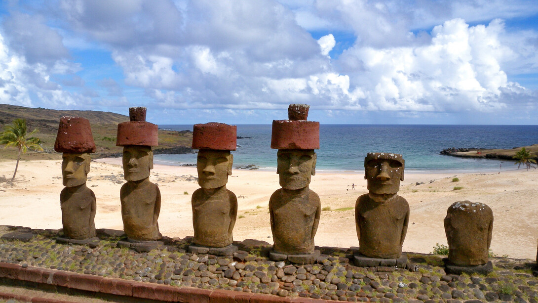 Image of Moai with their pukao (top-knots): Adam Stanford © Aerial-Cam Ltd for RNLOC