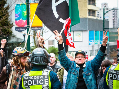 Demonstrators in Vancouver, British Columbia, rally against the Olympics, raising concerns over social and environmental impacts