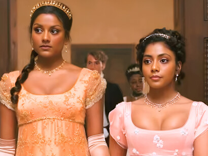 Kate Sharma and Edwina Sharma from Bridgerton wearing richly detailed gowns and jeweled headpieces, reflecting the return of decorative femininity