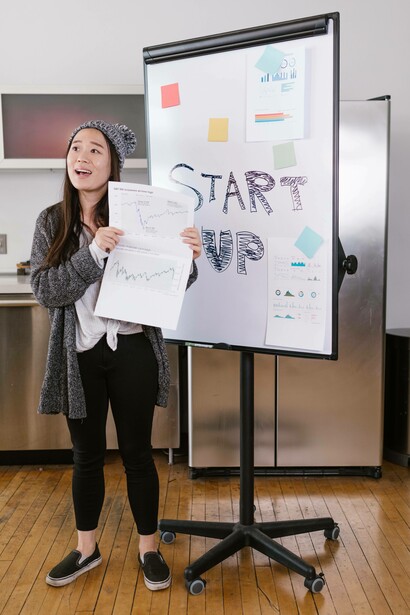 Woman sharing figures related to startup