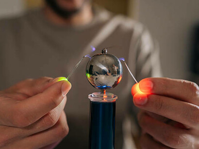 A Tesla coil generating spectacular electrical arcs and plasma during a high-voltage physics demonstration
