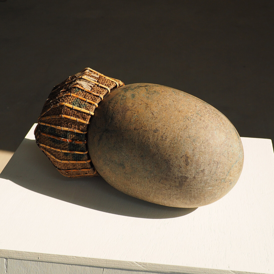 Sopheap Pich, Seed (Krognung No. 2). Stone, bamboo, rattan, burlap, plastic, metal wire, 42.5 x 18 x 20cm, 2015. Courtesy of the artist and Tyler Rollins Fine Art