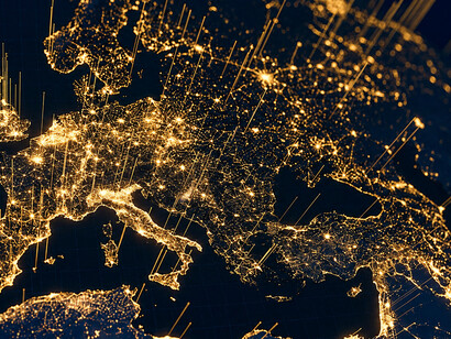 Earth at night reveals a vast satellite-supported communications network linking continents through advanced global infrastructure