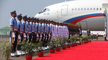 Russian President Vladimir Putin arrives in India aboard a Russian government aircraft, welcomed by Indian military personnel