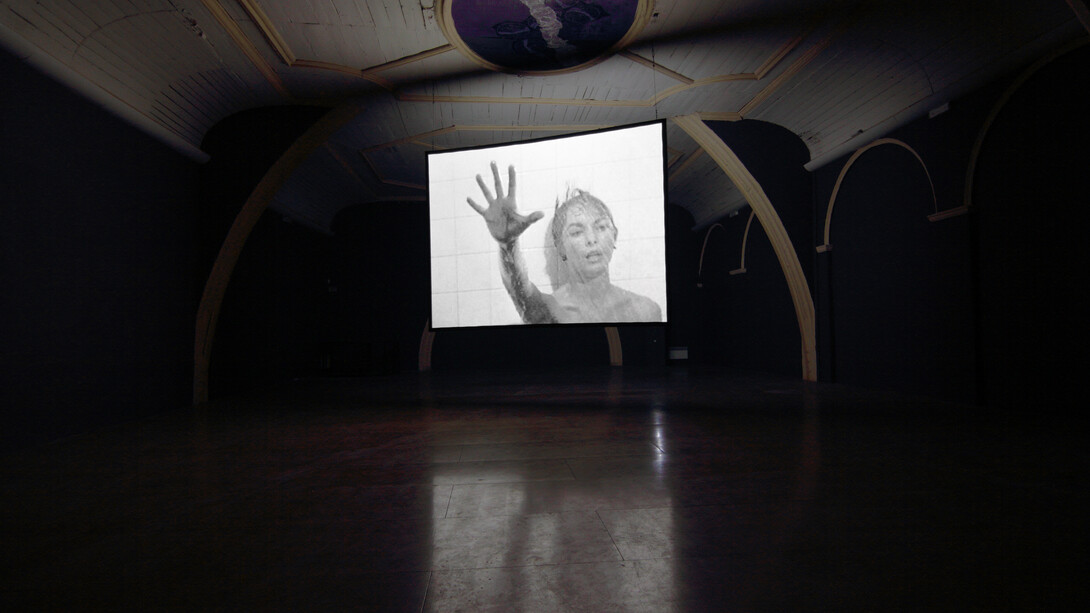 Douglas Gordon, 24 Hour Psycho, 1993. Video Installation. Dimensions variable. Installation view Le Mejan, Arles, 2011. © Studio lost but found / VG Bild -Kunst, Bonn 2014 Photo Studio lost but found / Bert Ross. Courtesy Studio lost but found, Berlin. From Psycho. 1960. USA. Directed and Produced by Alfred Hitchcock. Distributed by Paramount Pictures. © Universal City Studios.