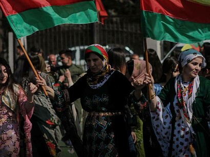 Kurdish women at a celebration of the anniversary of the revolution in Rojava (Photo by Firat News Agency) 