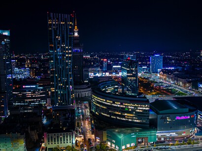 A city landscape at night. Many businesses can very easily list what they produce or what they do