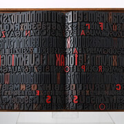 Giorgio Milani, Kafka. Il processo, 2002, assemblaggio di caratteri tipografici di legno, cm. 57x81x10