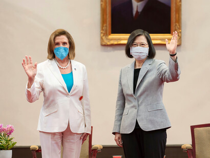 US House Speaker Nancy Pelosi and Taiwanese President Tsai Ing-wen wave during a meeting in Taipei