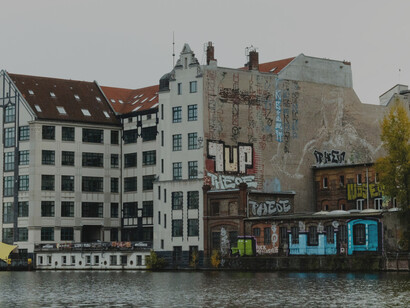 The urban landscape of Berlin, Germany, is increasingly shaped by gentrification and the housing crisis, as rising property values and new developments transform the city’s traditional urban buildings