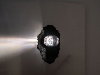 Phillip Lai, Untitled (Hypnos) (detail), 2023. Aluminum, incinerated breakfast cereal, epoxy resin, rotating beacon light, electronics, 164.5 x 115.2, 22.8 cm. Courtesy of the artist and Kiang Malingue