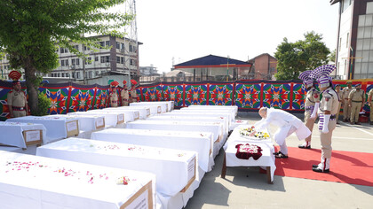 Indian interior minister Amit Shah lays a wreath at the coffins of the victims of the terror attack in Kashmir