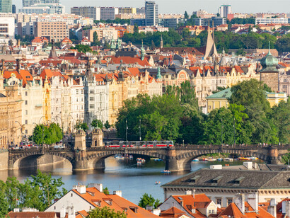Prague’s bridges, river and densely packed historic rooftops, symbolising the city’s captivating beauty