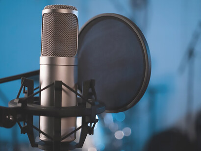 Close up professional microphone and pop filter