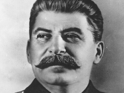 Joseph Stalin, the iconic Soviet leader, Stalin is shown with a stern expression, his intense gaze projecting a sense of determination and authority 