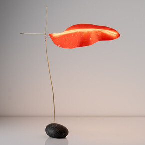 Jake Coan, Touchstone Leaf, 2023. Stone from Little Cranberry Island, ME, touch sensor, brass tube/rod, wire, LED filament, paper, 21" H. Courtesy of the artist and Hostler Burrows Gallery