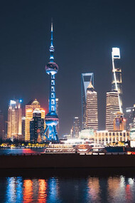Shanghai's skyline at night dazzles with a riot of colors, showcasing a city that never sleeps and always shines bright